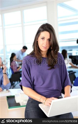 a woman working in an open space