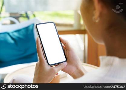 A women holding phone showing white screen