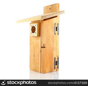 a wooden bird house on white background