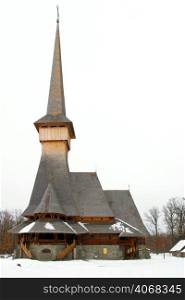 A Wooden Church with a tall Steeple, Sighet, Romania.