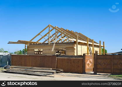 a wooden country house under construction