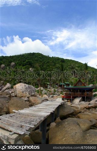 A wooden jetty on the coast of Koh Tao, tranquil, tranquility, tropical, paradise, pristine, tropical, heaven, delight, joy, haven, retreat, sanctuary, oasis, Thailand.