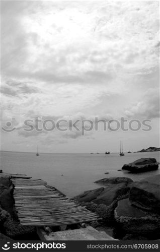 A wooden jetty on the coast of Koh Tao, tranquil, tranquility, tropical, paradise, pristine, tropical, heaven, delight, joy, haven, retreat, sanctuary, oasis, Thailand.