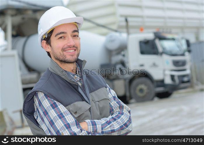 a worker is posing confidently