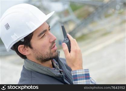 a worker using the walkie-talkie