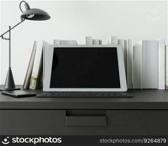 A working room with a laptop with a lamp placed on the table.