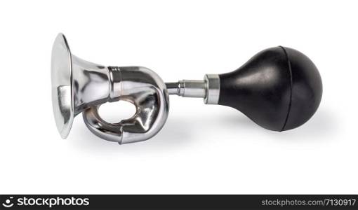 A worn iron horn or klaxon from a vintage car or bicycle Isolated with a shadow.With clipping path