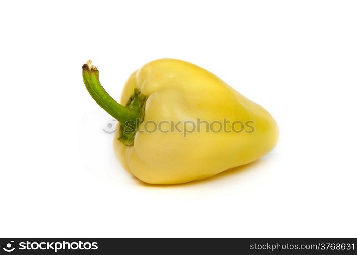 A yellow bell sweet pepper isolated on plain white background.