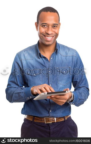 A young african business man working with a laptop