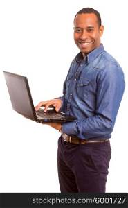 A young african business man working with a laptop