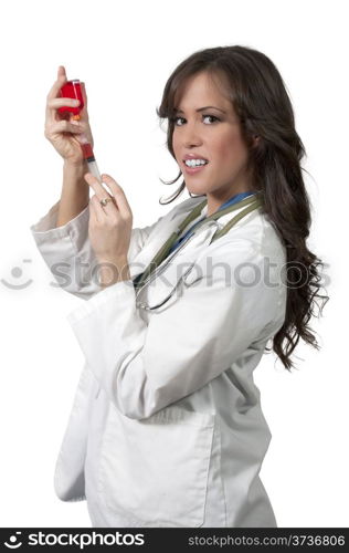 A young beautiful woman doctor with a medical syringe with medicine