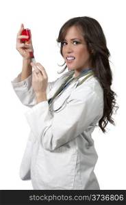 A young beautiful woman doctor with a medical syringe with medicine