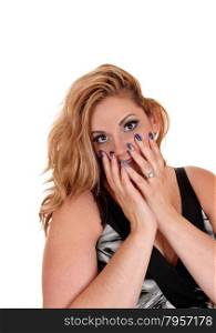 A young beautiful woman holding her finger on her face with her bluefingernails, isolated for white background.