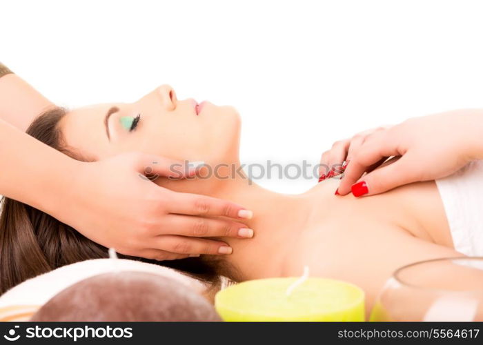 A young beautiful woman relaxing at a spa (wellness concept)