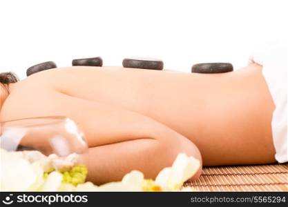 A young beautiful woman relaxing at a spa (wellness concept)