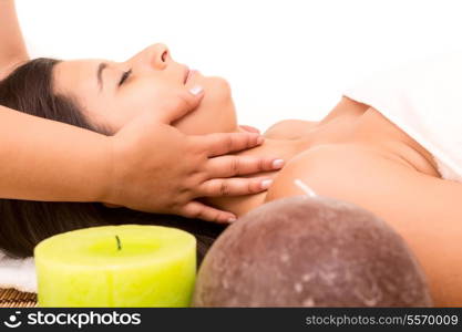 A young beautiful woman relaxing at a spa (wellness concept)