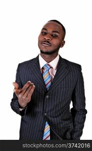 A young black business man standing in a suit and tie, gesturing withhis hands for white background.