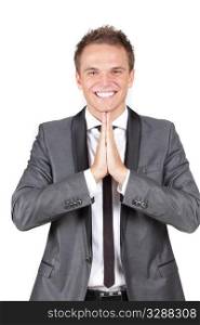 A young caucasian businessman expressing his gratitude in prayer