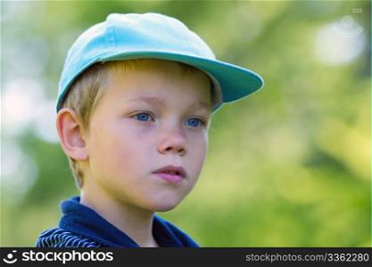 A young child with a cap