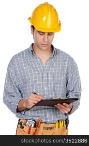 A young contruction worker taking noted a over white background