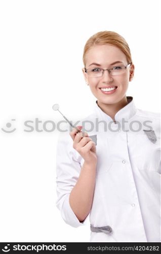A young dentist with a tool on a white background