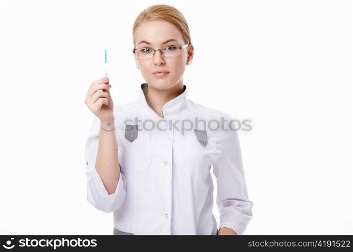 A young doctor with pregnancy tests on a white background