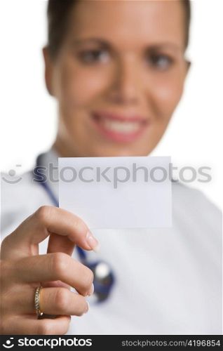 a young doctor with stethoscope. holds a business card