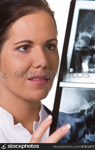 a young doctor with stethoscope. with a radiograph.