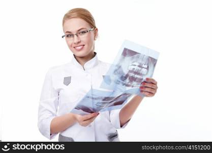 A young doctor with x-rays on a white background