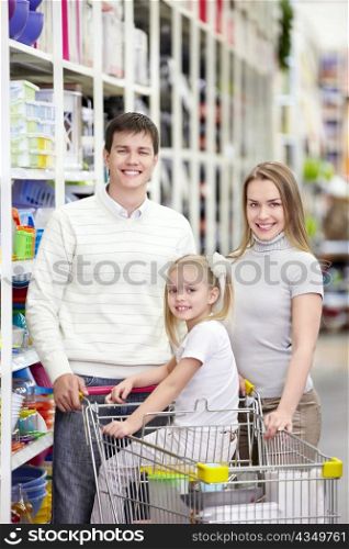 A young family is shopping in a store