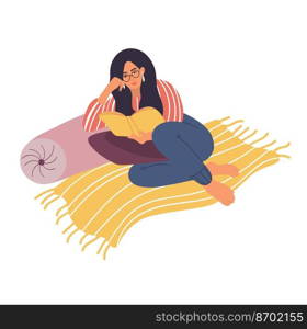 A young girl is sitting on the floor reading a book. The student learns at home. Isolated on a white background. A teenager is preparing for exams.. A young girl is sitting on the floor reading a book.A teenager