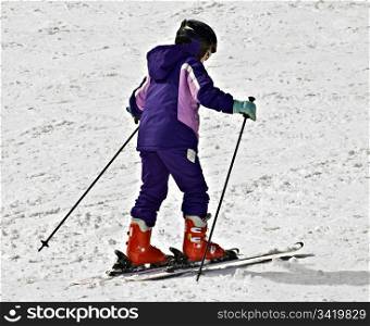 A young girl walking to the chair lift.