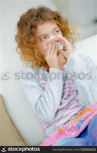 a young girl with cold