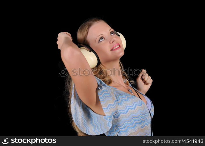 A young girl with headphones to have fun