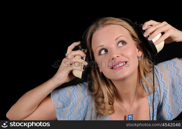 A young girl with headphones to have fun