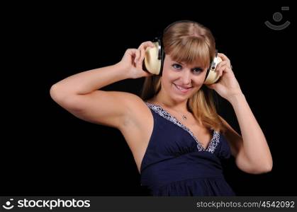 A young girl with headphones to have fun
