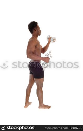 A young handsome African American man in black underwear standingwit dumbbell&rsquo;s in his hands, isolated for white background.