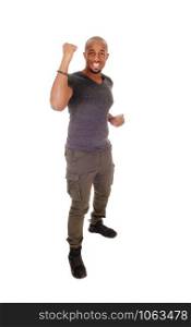 A young handsome African American man standing isolated for white background with his fists up, ready for a fight