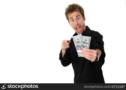 A young handsome man holding a lot of new hundred dollar bills isolated on white background. This newly redesigned US currency was released for circulation in October of 2013.