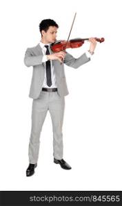 A young handsome man in a gray suit playing the violin, looking concentrated serious, isolated for white background