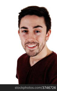 A young man standing for white background very relaxed in a portrait picture with a beard.