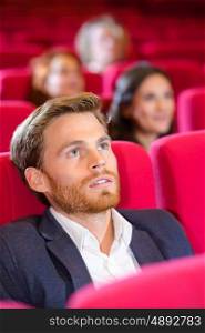 a young man watching movies