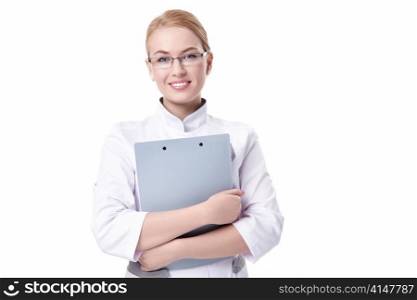 A young nurse with a clipboard on a white background