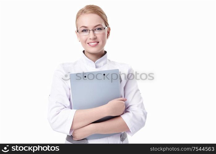 A young nurse with a clipboard on a white background