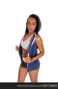 A young pretty african american woman standing in sportswear and ablue hoodie, isolated for white background.