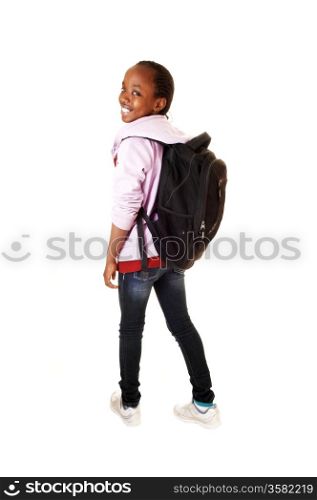 A young pretty black girl in jeans and a pink jacked, standing for white&#xA;background in the studio ready for school.&#xA;