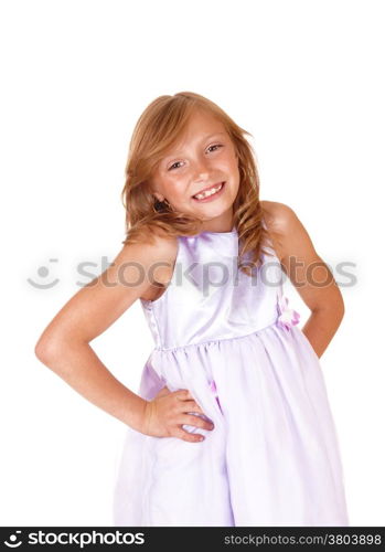 A young pretty girl dress and curly blond hair standing smiling, isolatedfor white background.