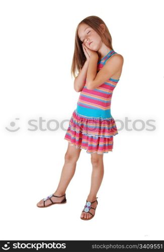 A young pretty girl standing in the studio having her hands on one chickand she sleeps as she stands, for white background.