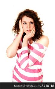 A young pretty woman standing and holding her head, in an pink whitesweater for white background.