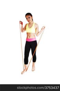 A young slim Chinese woman in an exercise clothing standing for whitebackground with a rope in her hand.